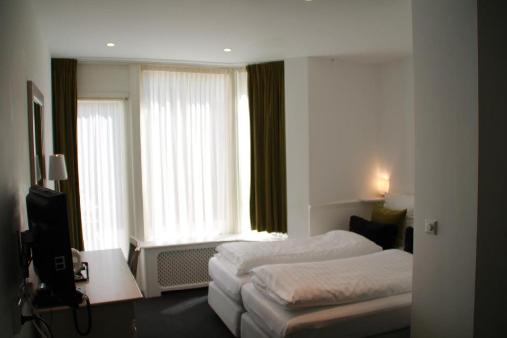 De Doelen Hotell Leiden Rom bilde